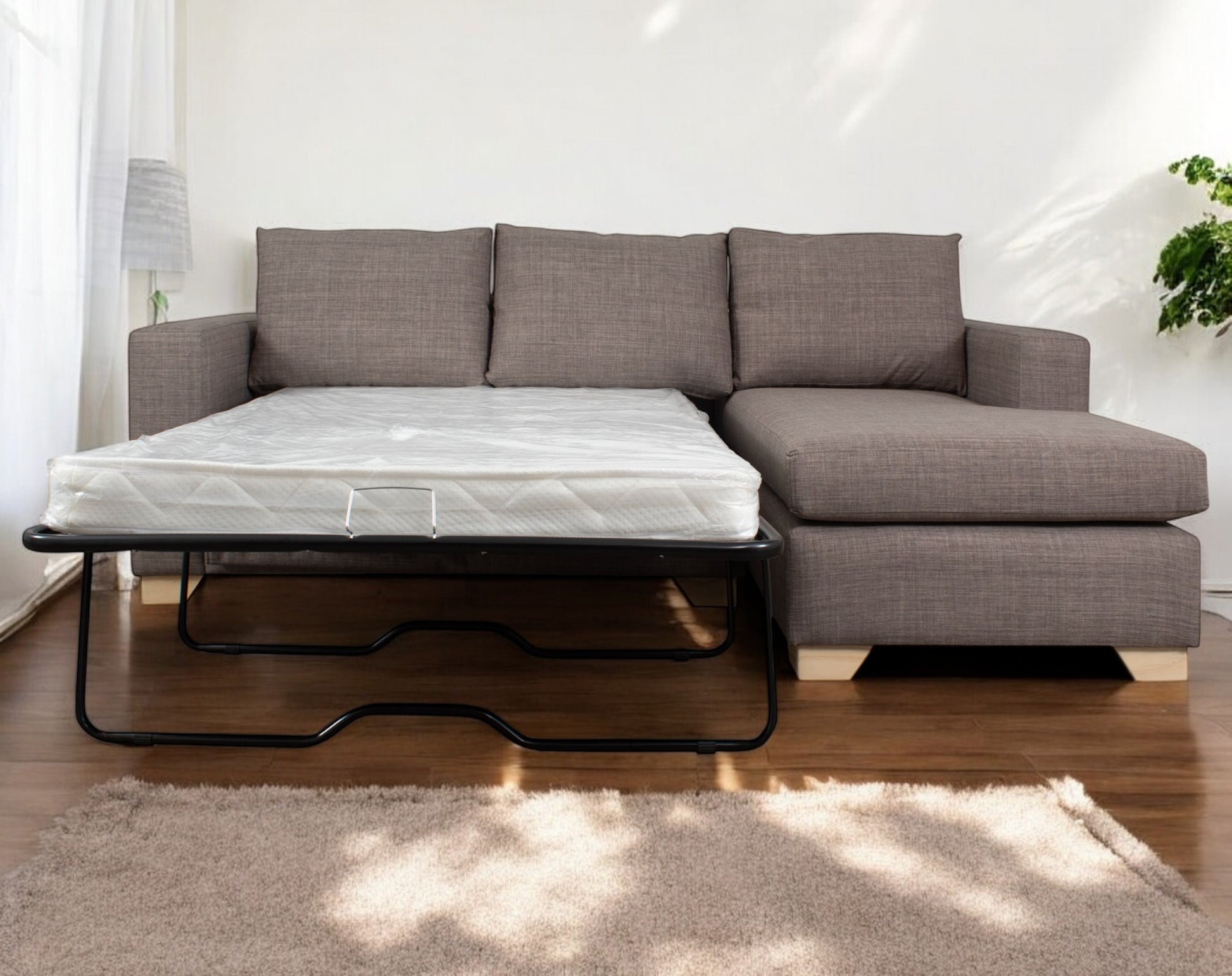 https://www.livingstore.cl/wp-content/uploads/2019/03/seccional-cama-urban-1-plaza-y-media-bariloche-gris-frente-abierto-photoroom.jpg