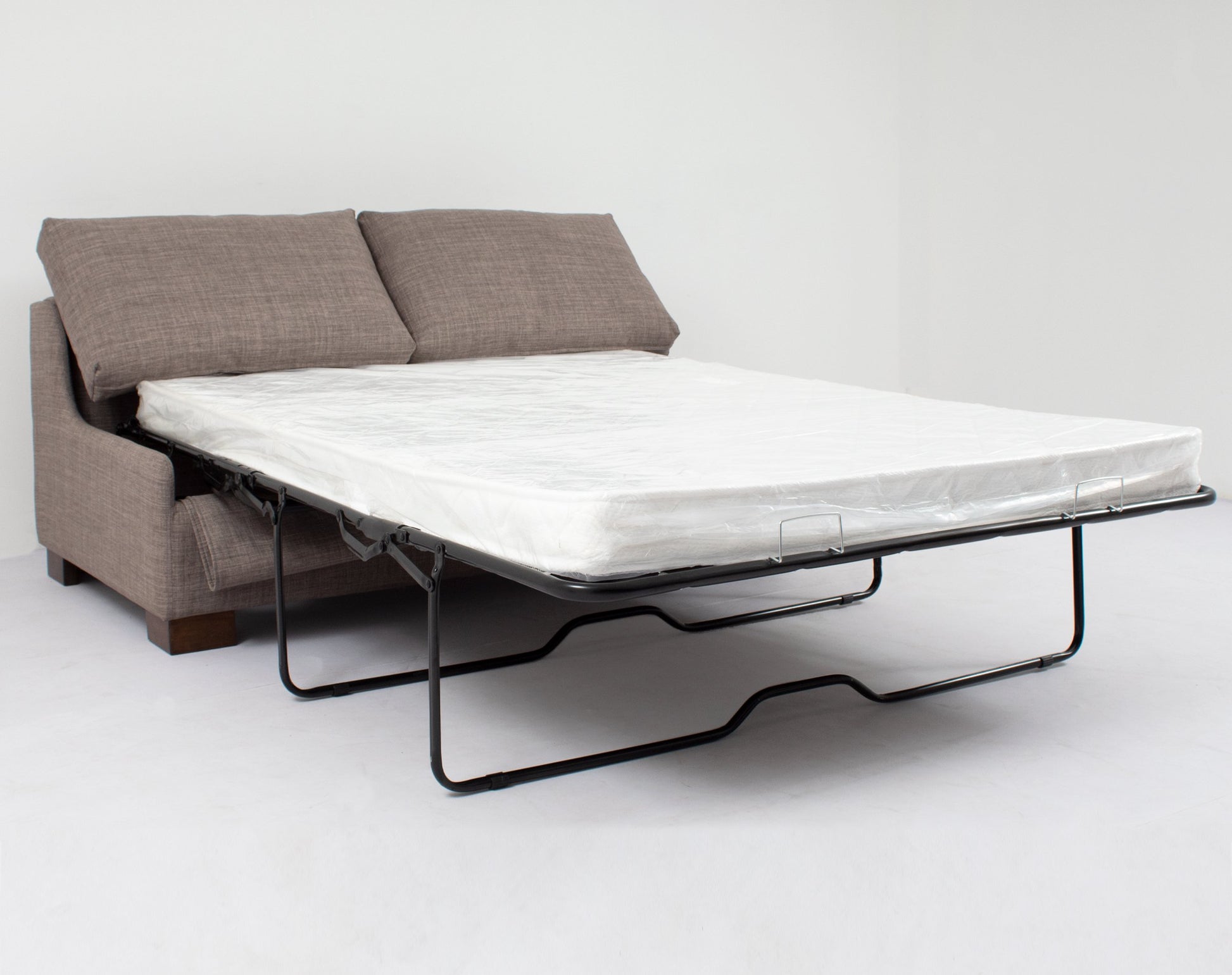 https://www.livingstore.cl/wp-content/uploads/2023/06/sofa-cama-full-james-bariloche-castano-iso-abierto.jpg